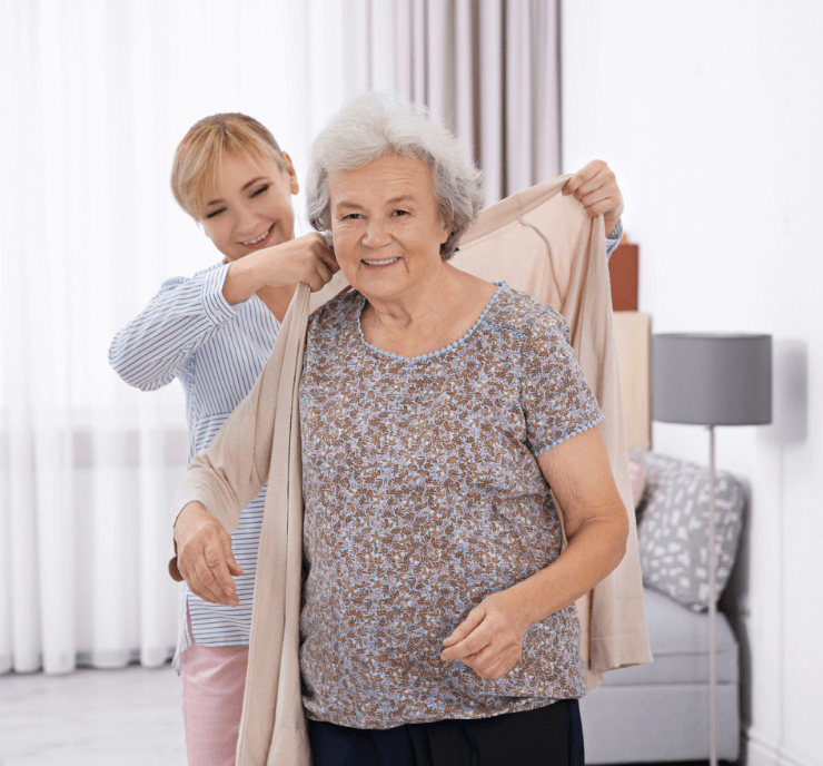 helping-senior-put-on-sweater (1)